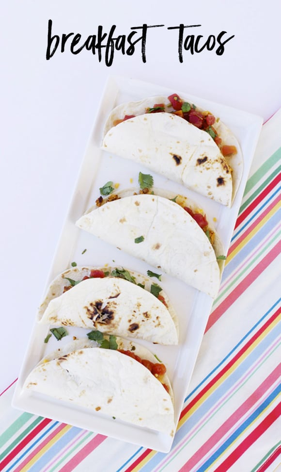 Looking for breakfast for dinner ideas? Well, these breakfast tacos are perfect. They also make the perfect weekend brunch recipe. Make up a platter because they're going to go fast! #tacos 