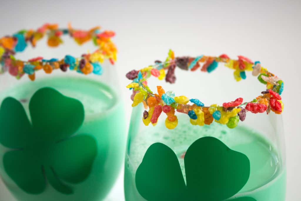 They're going to love these simple Saint Patrick's Day cereal ideas! From Fruity Pebble rimmed glasses to Lucky Charm topped donuts, plus more. 