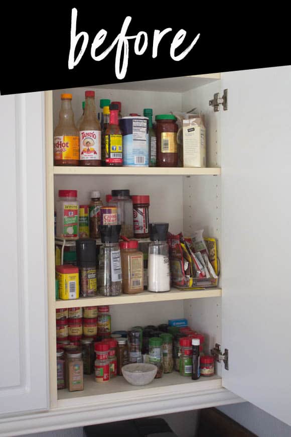 The before photo of our spice cabinet organization project