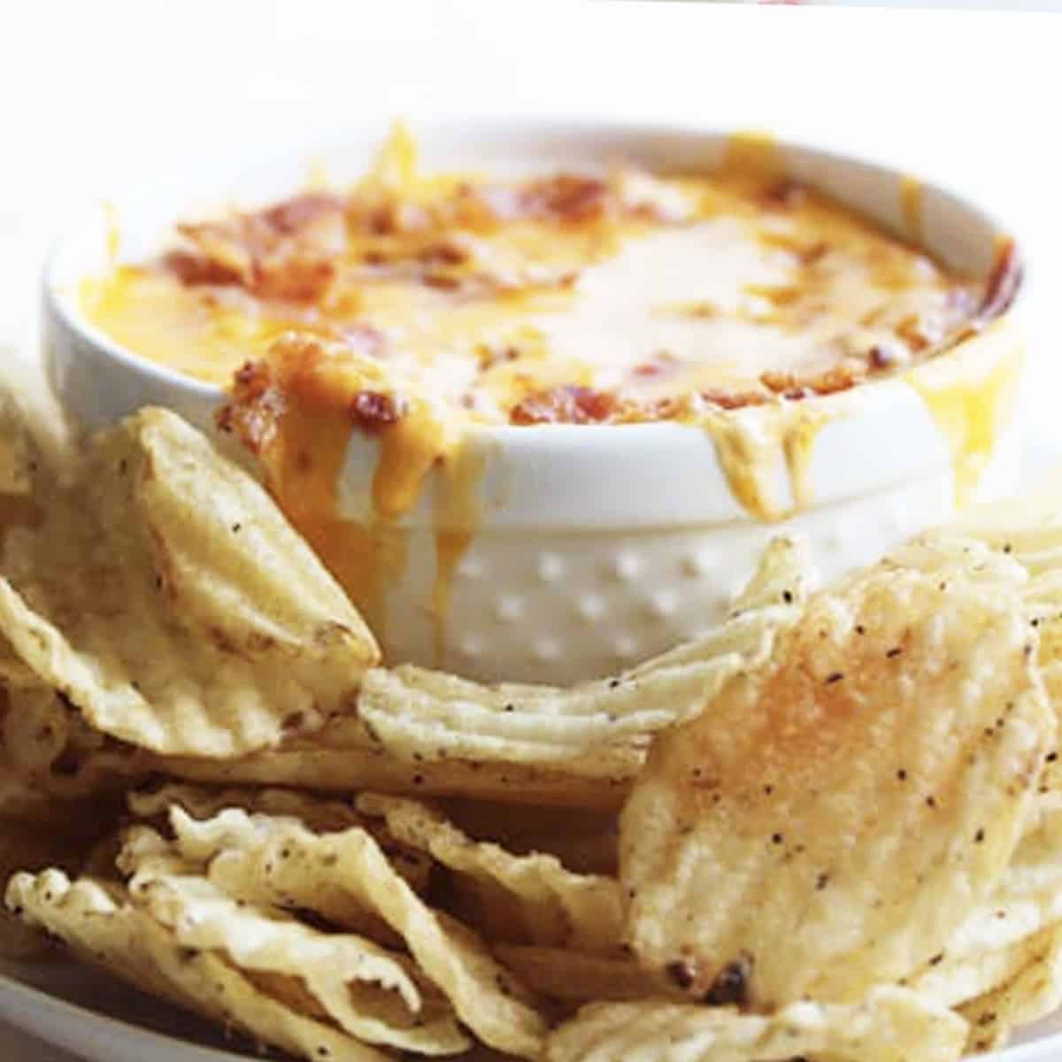 https://thoughtfullysimple.com/wp-content/uploads/2022/05/bacon-beer-cheese-dip.jpg