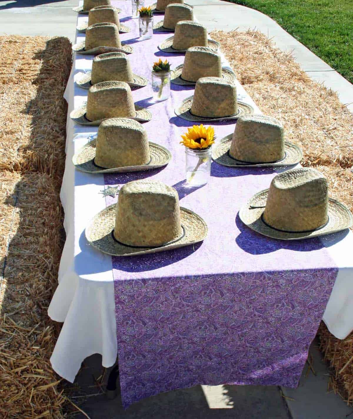 hay bale seating at a table