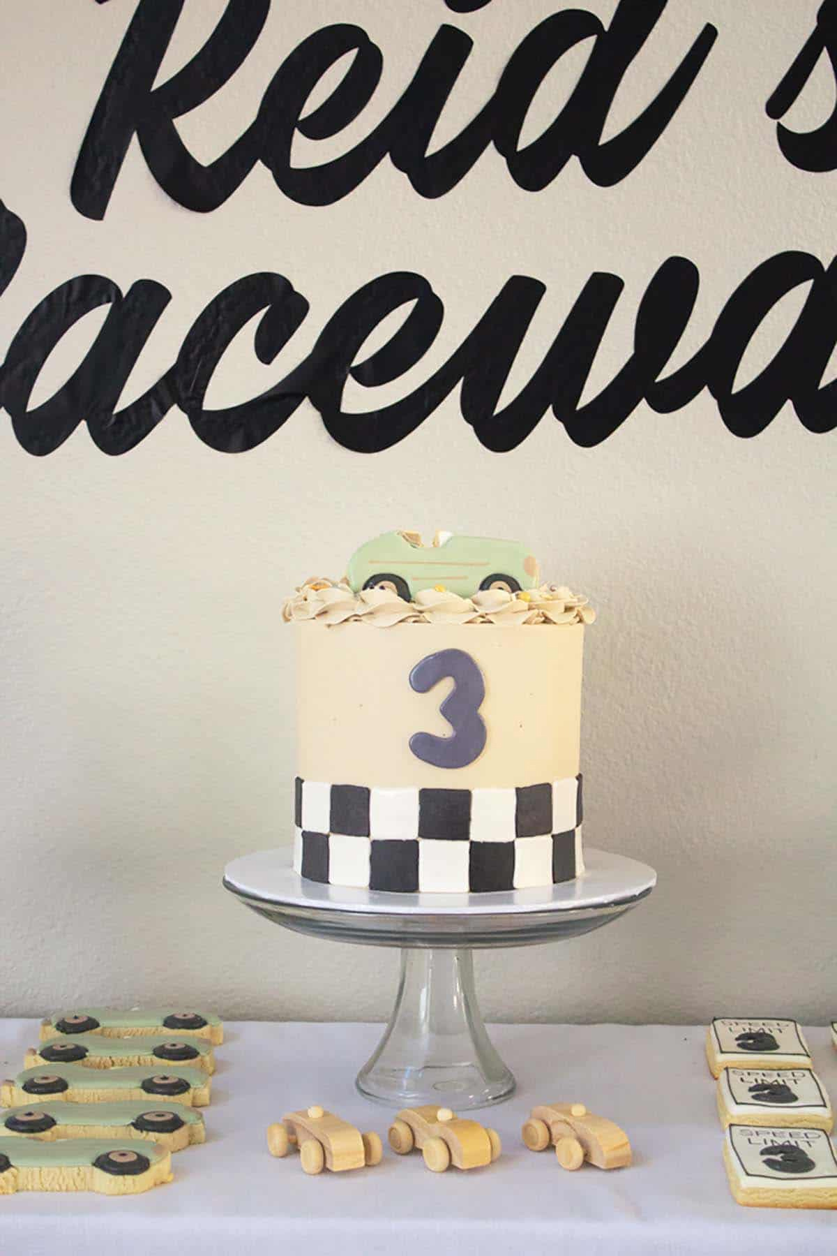 Modern race car birthday cake on the dessert table