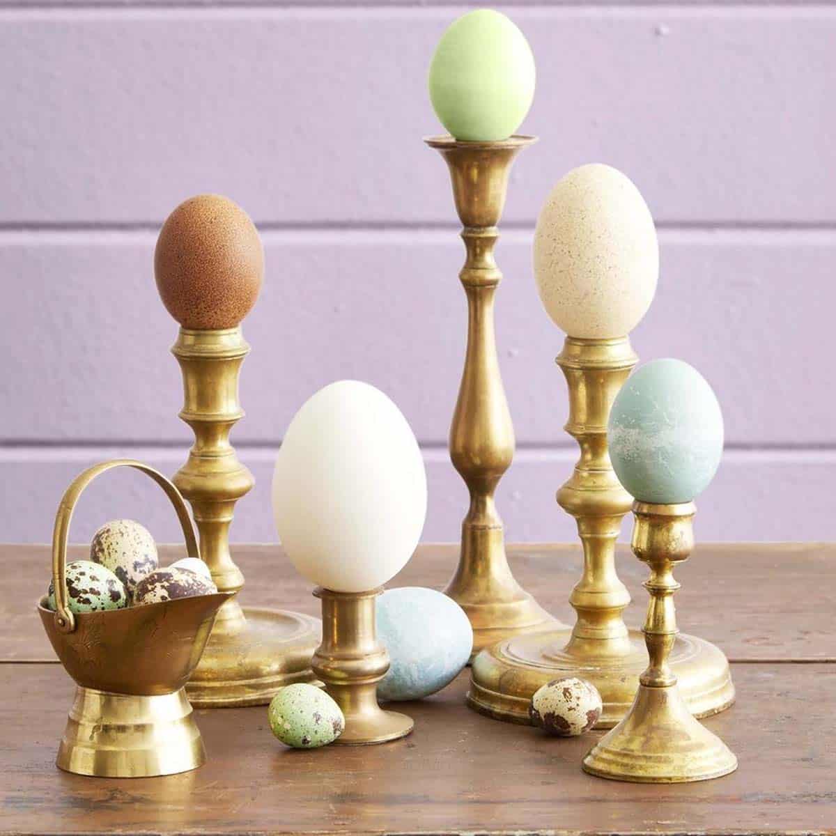 Candlesticks with eggs for Easter decor
